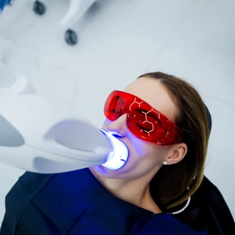 dentist-performs-teeth-whitening-using-whitening-g-2026-04-04-23-38-06-utc